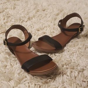 Flat black sandals
